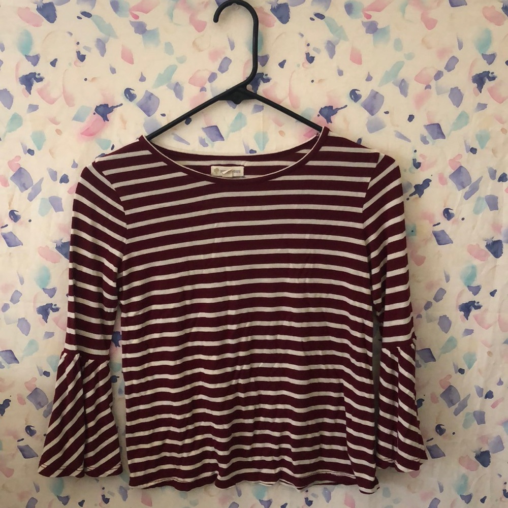 Red and white striped shirt.